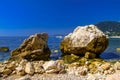 Sea beach with stones and rocks, Beausoleil, Nice, Nizza, Alpes-Maritimes, Provence-Alpes-Cote d `Azur, Cote d `Azur, French Rivie Royalty Free Stock Photo