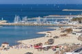 Panoramic top view of the Tel-Aviv beach and marina on Mediterranean sea. Royalty Free Stock Photo