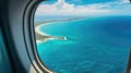 Sea and beach, view from an airplane window. Travel and air transportation Royalty Free Stock Photo