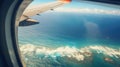 Sea and beach, view from an airplane window. Travel and air transportation Royalty Free Stock Photo