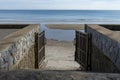 Sea behind the opened door house outside Royalty Free Stock Photo