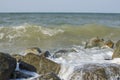 The sea with big rocks on the shore