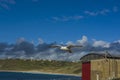 Sea bird flying over sennen cove breakwater Royalty Free Stock Photo