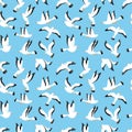 Sea birds seamless pattern. Cute white seagulls fly above ocean on sky. Isolated objects on blue background. Marine Royalty Free Stock Photo
