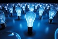 In a sea of blue lightbulbs, the illuminated lamp signals ingenuity