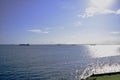 Sea with blue sky and some boats