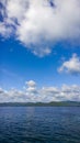 Sea and blue sky. White clouds over lake. Summer Landscape Royalty Free Stock Photo