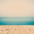 Sea blurred and wood table for space Royalty Free Stock Photo