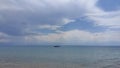 Sea boat clouds sky mountains blue