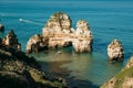 A sea boat sails along the Atlantic Ocean off the coast of Portugal.