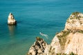 A sea boat sails along the Atlantic Ocean off the coast of Portugal.