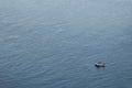 Sea and boat view from a high place. Beautiful natural seascape in summer.