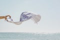 Sea breeze blowing the stripes scarf Royalty Free Stock Photo