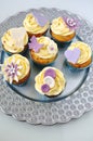 Sea buckthorn cupcakes on silver platter Royalty Free Stock Photo