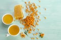 Sea buckthorn, honey and cup of tea with Sea buckthorn Royalty Free Stock Photo