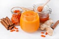 Sea buckthorn smoothie with ginger, honey and cinnamon Royalty Free Stock Photo