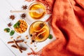 Sea buckthorn tea in wooden bowl, honey, Sea buckthorn juice on white wooden table. top view with copy space Royalty Free Stock Photo