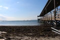 Sea calm skies and docks Royalty Free Stock Photo