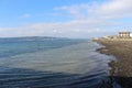 Sea calm skies and docks Royalty Free Stock Photo