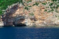 Sea cave with blue water at daytime Royalty Free Stock Photo