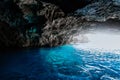 Sea cave with blue water Royalty Free Stock Photo