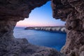 Sea cave at dusk on Cape Greco near Ayia Napa, Cyprus Royalty Free Stock Photo