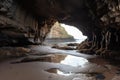 sea cave at low tide, revealing hidden treasures