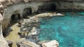 Sea caves cape greco Cyprus blue lagune water sea