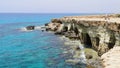 Sea caves cape greco Cyprus blue lagune water sea travel view