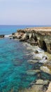 Sea caves cape greco Cyprus blue lagune water sea travel views