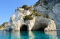 Sea caves on Marathonisi island Royalty Free Stock Photo