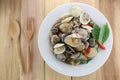 sea clams or RIDGED VENUS of Stir sauce in white dish. Royalty Free Stock Photo