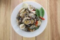 sea clams or RIDGED VENUS of Stir sauce in white dish. Royalty Free Stock Photo