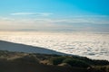 Sea of clouds below the summit of Teide volcano in Tenerife