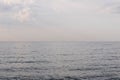 Sea with clouds in cloudy weather. Infinite horizon Royalty Free Stock Photo