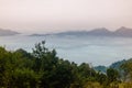 Sea of clouds at the dawn with a view of mountain range. Nan province, Thailand. Royalty Free Stock Photo