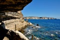 A sea coast in Corsica, Corse, France Europe with cliffs and path in the rocks Royalty Free Stock Photo