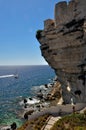 A sea coast in Corsica, Corse, France Europe with cliffs and small town Royalty Free Stock Photo