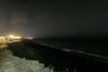 Sea coast at night. Starry night sky over the sea. Royalty Free Stock Photo