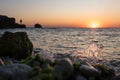 sea coast and the rocks above the sea during sunset. Beautiful sea landscape. Royalty Free Stock Photo