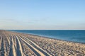 Sea coast. Wheel ruts on the sand Royalty Free Stock Photo