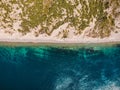 Sea coastline with cliff, trees and clear blue water from drone. Top view. Aerial view Royalty Free Stock Photo