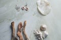 Sea collection on grey marble background. Seashell and mother-of-pearl earrings. Summer jewelry. Royalty Free Stock Photo