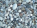 Sea colorful and gray small stones pebbles on a beach Royalty Free Stock Photo
