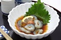 Sea cucumber with vinegar, Japanese food with rice wine Sake Royalty Free Stock Photo