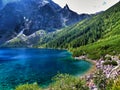 Sea Eye lake and mountain shelter in High Tatras in Poland.