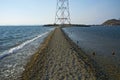 In the sea filled the road to the lighthouse, in the middle of the Sea Beach line passes