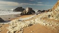 Sea Foam (aka Beach Foam, Ocean Foam or Spume) on a Sandy Beach on the Atlantic Coast of Portugal at