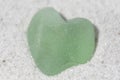 Sea Foam Heart Shaped Sea Glass on Sand