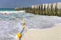Sea Foam on a Sandy Beach, Dubai, Emirates, Feb.2018 Royalty Free Stock Photo